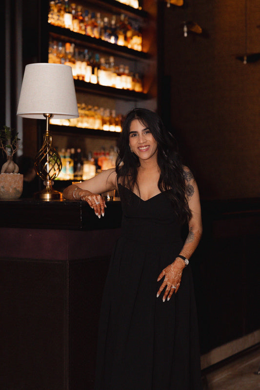 The Black V-Neck Pleated Dress